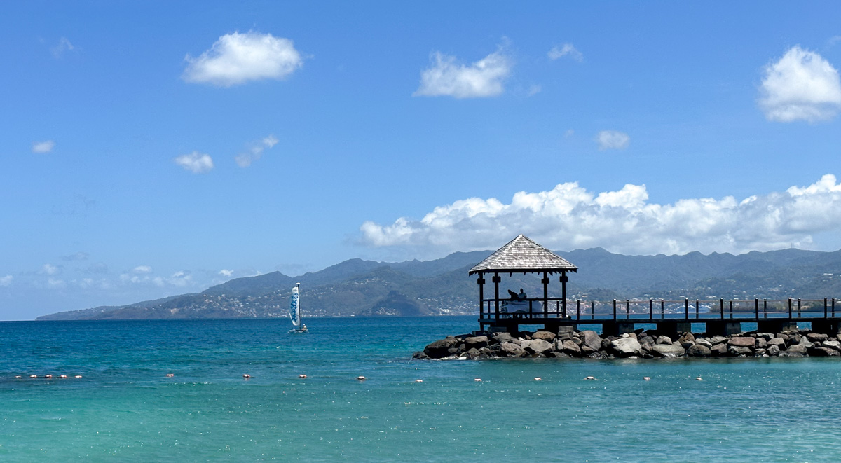 Boardwalk over the water ending in a gazebo housing the Grenada Spa.